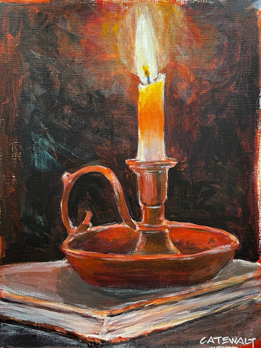 Single lit candle